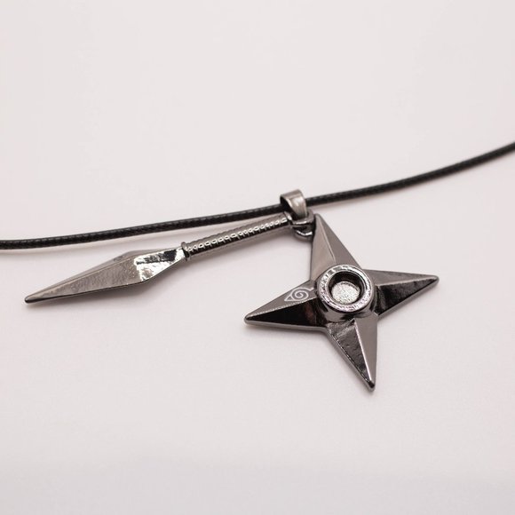 Naruto Shippuden Hidden Leaf Ninja Tools Shuriken & Kunai Necklace (New) - Picture 1 of 2